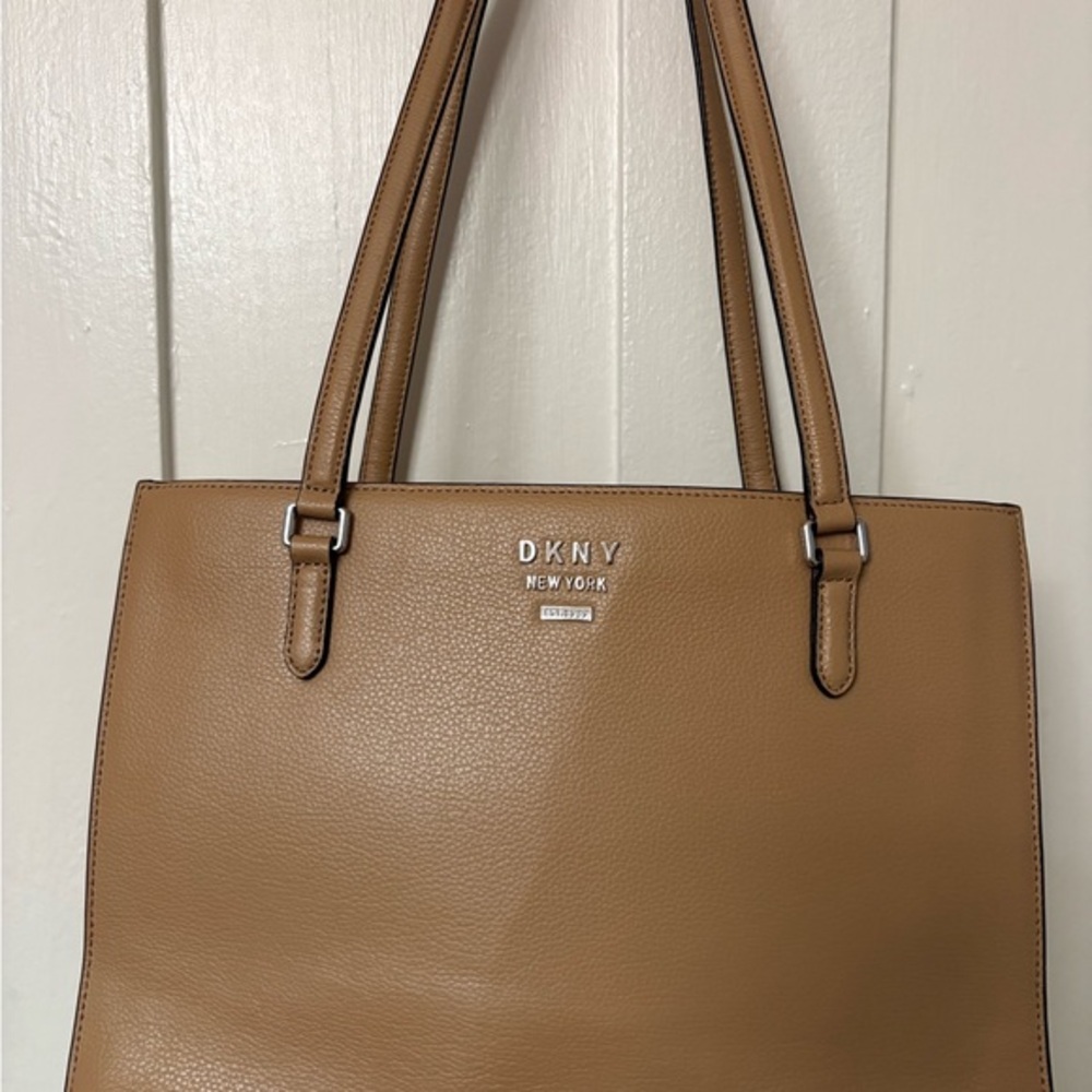 DKNY Tan Leather Tote Bag with Sophisticated Design.     New without tags!!